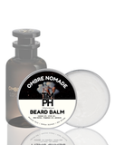 Ombre Nomade beard balm with a bottle on a white background
