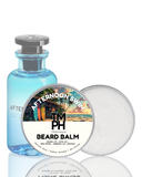 Blue bottle and white container labeled 'Afternoon Swim' with a beach scene on the label.