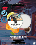 Beard balm packaging with beach scene background and product details.