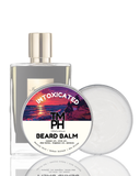 Beard balm packaging with a sunset design and branding on a white background