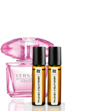 Two rollerball bottles labeled 'Absolutely Crystal' with a pink diamond-shaped container on a white background.