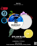 Dylan Blue TM PH Beard Balm packaging with lemon slice and flowers on a black background