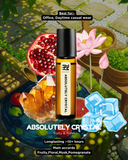 Roll-on bottle labeled 'Absolutely Crystal' with pomegranate, flowers, and crystals on a decorative background.