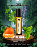 Acqua Amara perfume bottle with orange and leaves on a scenic background