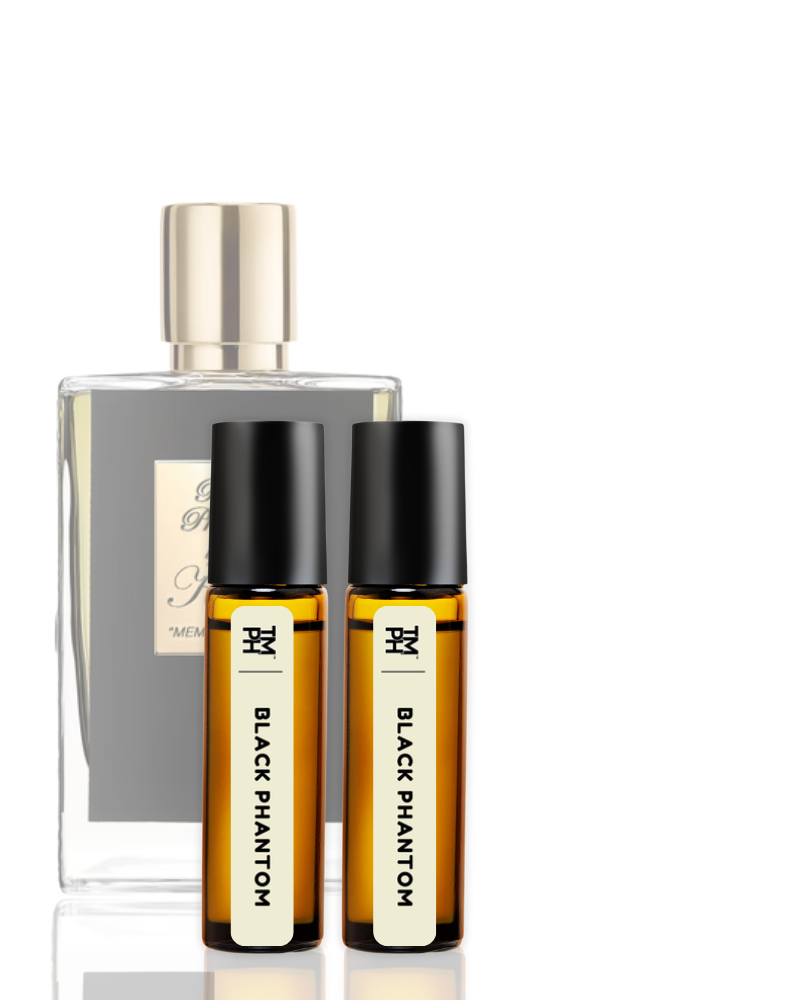 Perfume bottle and two Black Phantom rollerball bottles on a white background