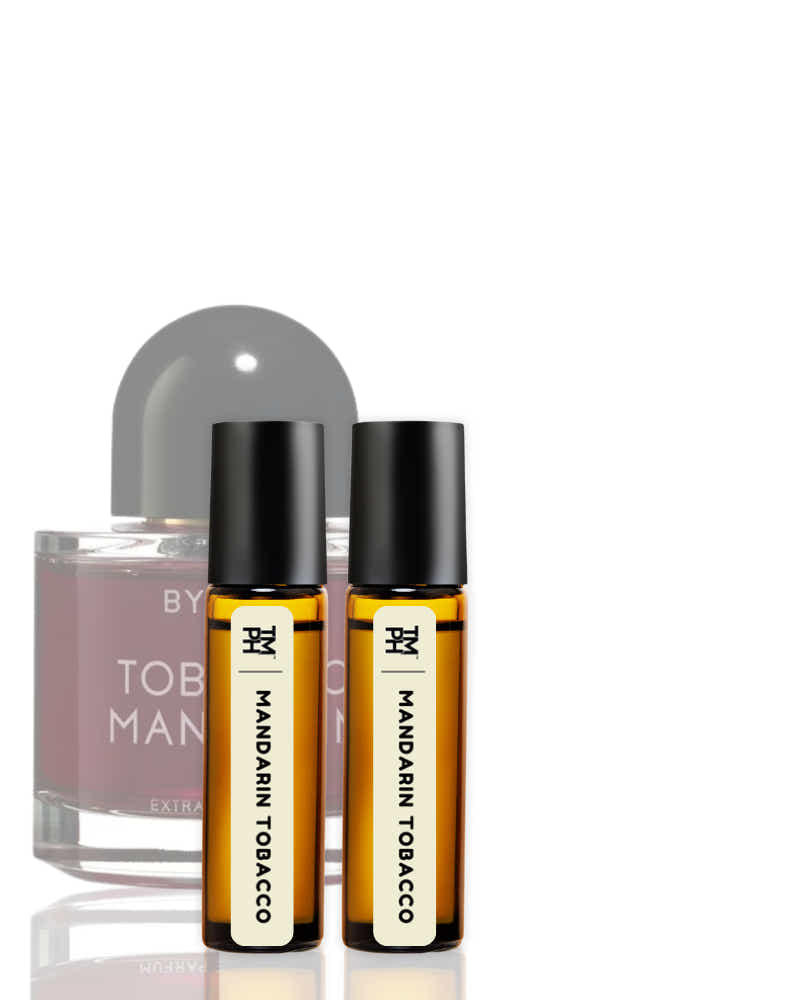 Two bottles of Mandarin Tobacco perfume by Byredo on a white background