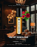 Velvet Rose & Oud perfume bottle on a wooden desk with decorative elements.