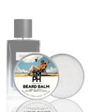 Beard balm packaging with a man in a chair on a beach label