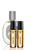 Two PHILOSYKOS perfume bottles on a white background