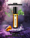 Roll-on perfume bottle labeled 'Beau de Jour' with a purple floral background