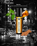 Absolute Amber perfume bottle with city street background
