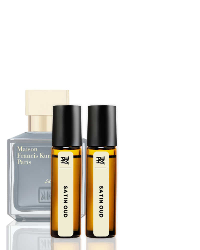 Two Satin Oud perfume bottles and a Maison Francis Kurkdjian bottle on a white background