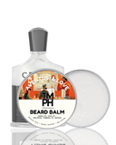 Beard balm with a label featuring a man and woman in a room, surrounded by books and a dog.