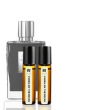 Set of perfume bottles with a large clear bottle and two smaller amber bottles on a white background