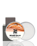 Beard balm container with 'The Encre Noire' branding on a white background