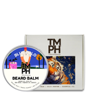 Beard balm container with 'TM PH' branding and a tiger illustration on the packaging.