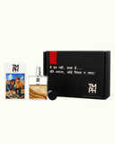 Perfume bottle with packaging and card on a white background