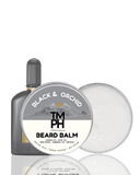 TM PH Black & Orchid beard balm with a bottle on a white background