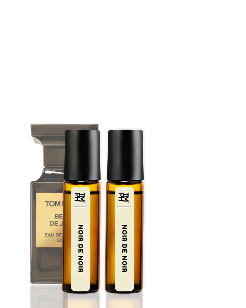 Two bottles of Tom Bihn Noir de Noir perfume on a white background