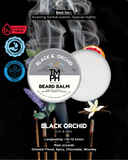 TM PH Black & Orchid beard balm packaging with smoke and floral elements on a dark background