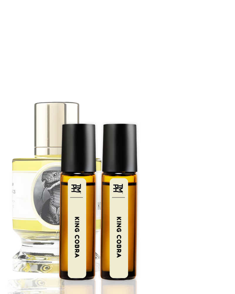 Two King Cobra perfume bottles and a larger bottle on a white background