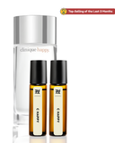 Clinique Happy perfume set with a large bottle and two smaller rollerball bottles on a white background.
