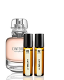 Givenchy perfume bottle with two Lintero It rollerball bottles on a white background