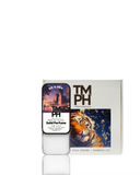 TM PH solid perfume and packaging with tiger design on a white background
