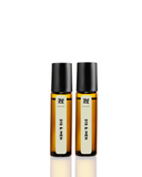 Two bottles of 212 & Men cologne on a white background