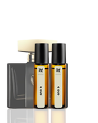 Two small amber glass bottles with black caps on a white background