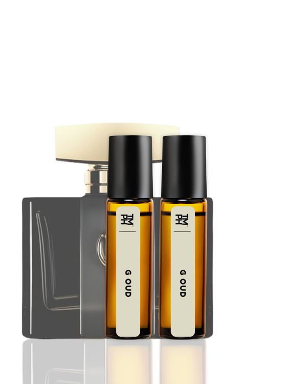 Two small amber glass bottles with black caps on a white background