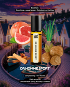Dr. Homme Sport cologne bottle with citrus and spice elements on a scenic background